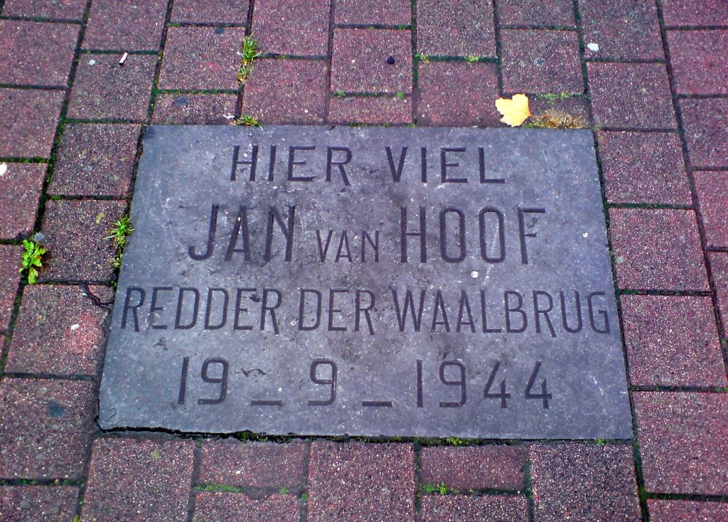 The inscription reads "Here fell Jan van Hoof saviour of the Waal Bridge"